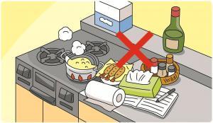 コンロの傍に置かれたティッシュやノートのイラスト